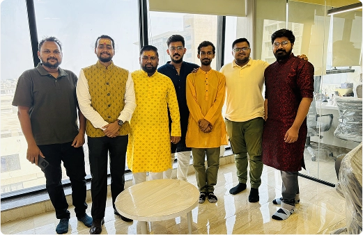 Team members in traditional attire