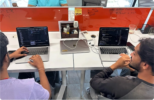 Team members coding together